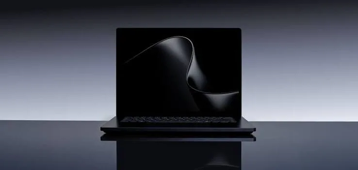 A premium laptop on a desk, illustrating Microsoft's new Surface Laptop Ultra