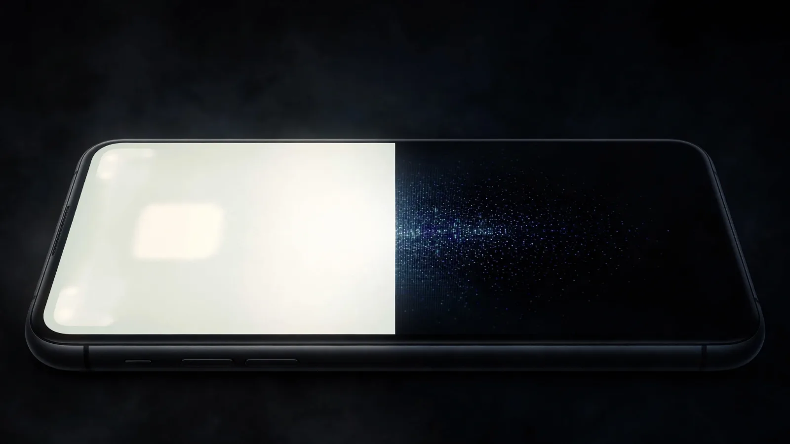 A phone displaying dark mode on an OLED screen in a dark room